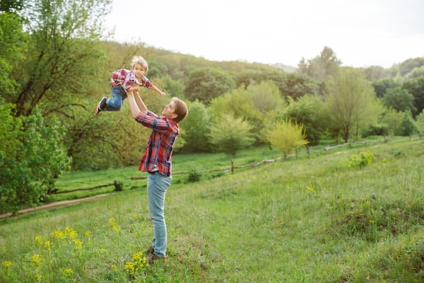 child playing with dad