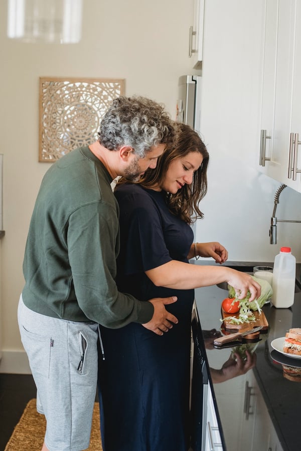 husband and wife cooking